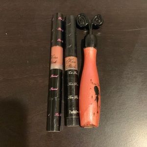 Vintage Too Faced glosses.  Without original labels.